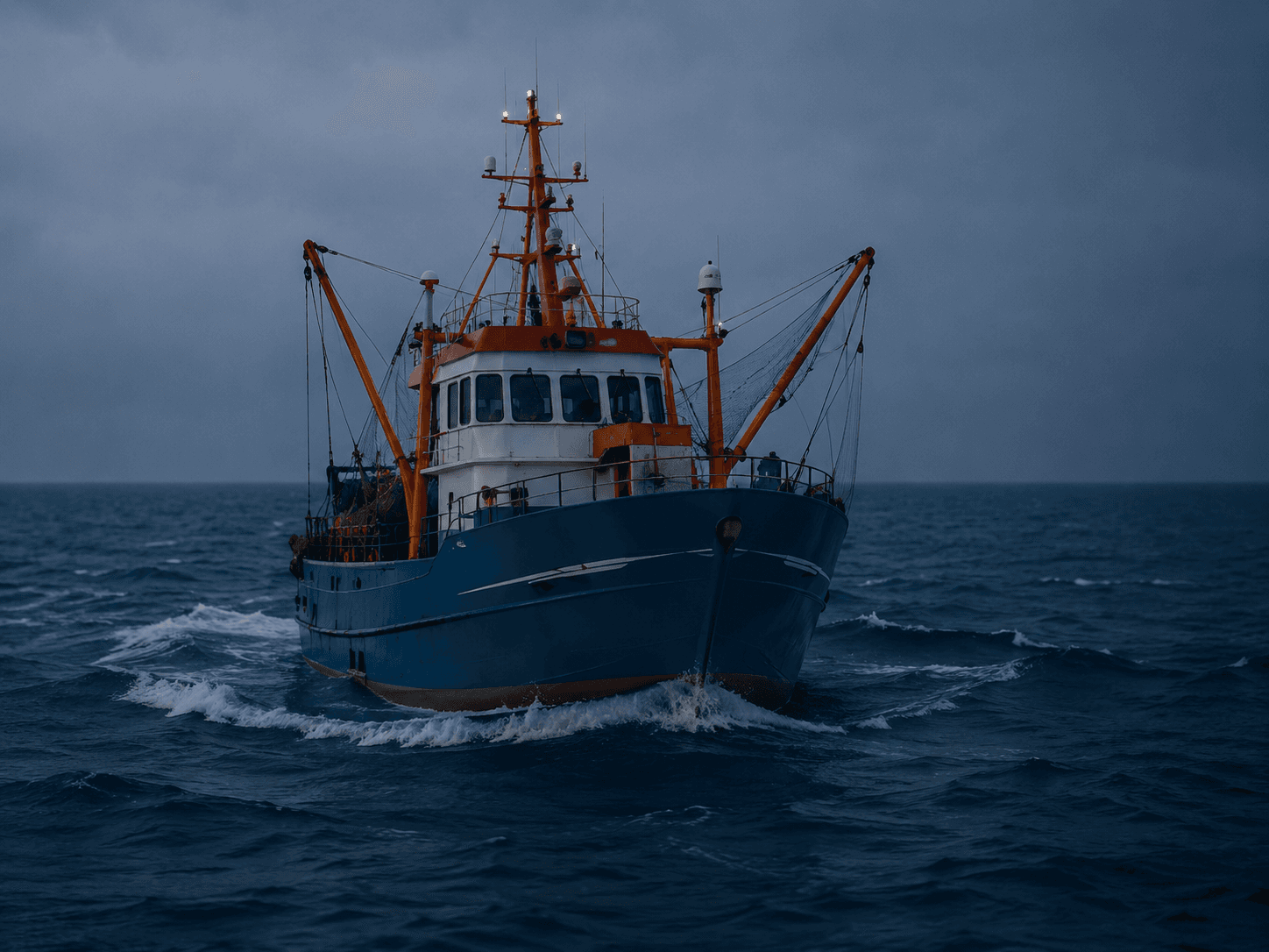 Fishing vessel working open water in low light